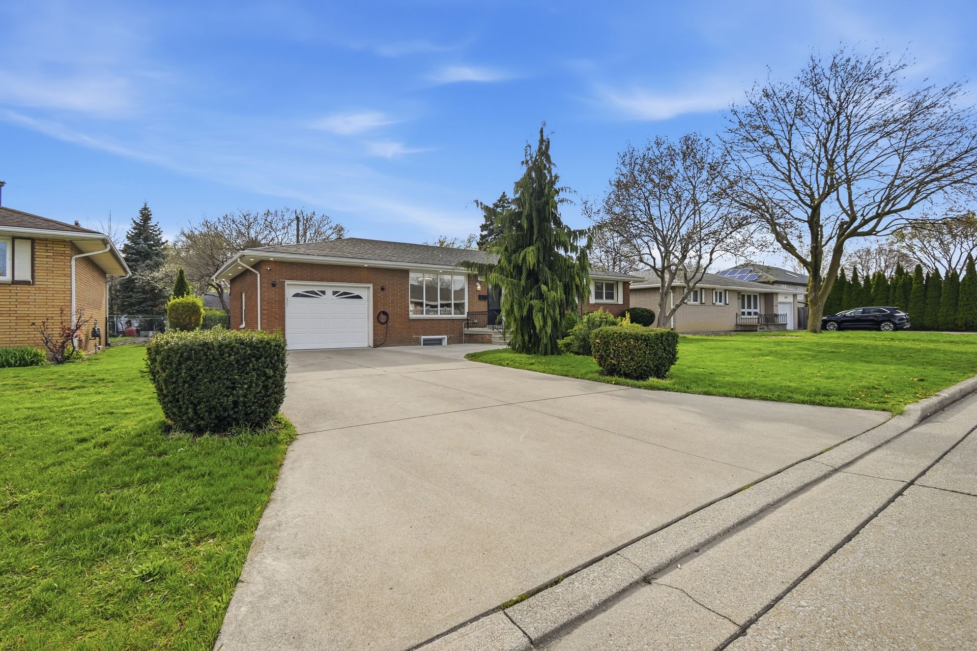 Front façade of 2435 McKay Avenue with brand-new roof