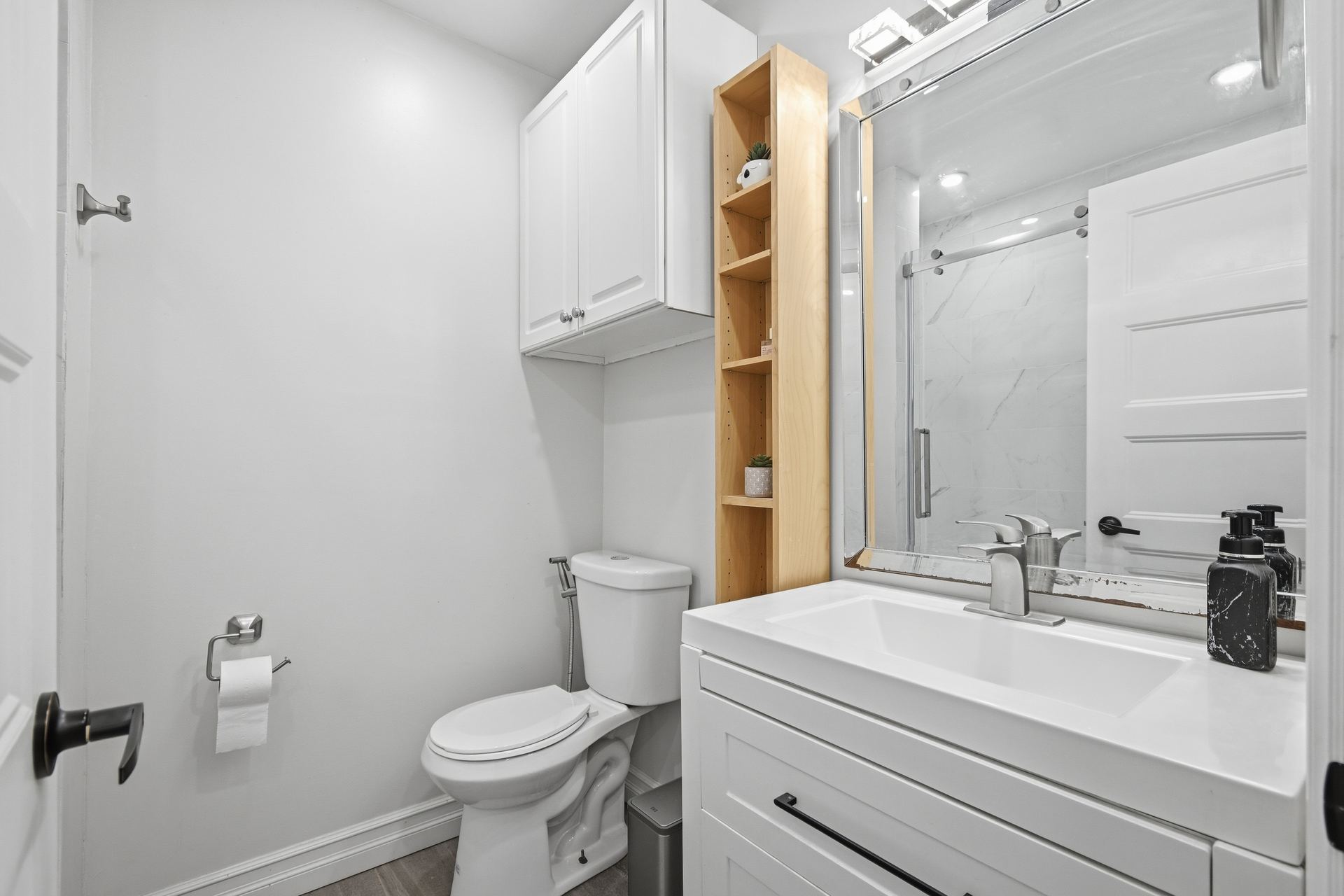 Renovated bathroom with glass shower